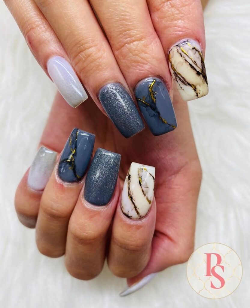 grey and white marble gel nail art on acrylic nails